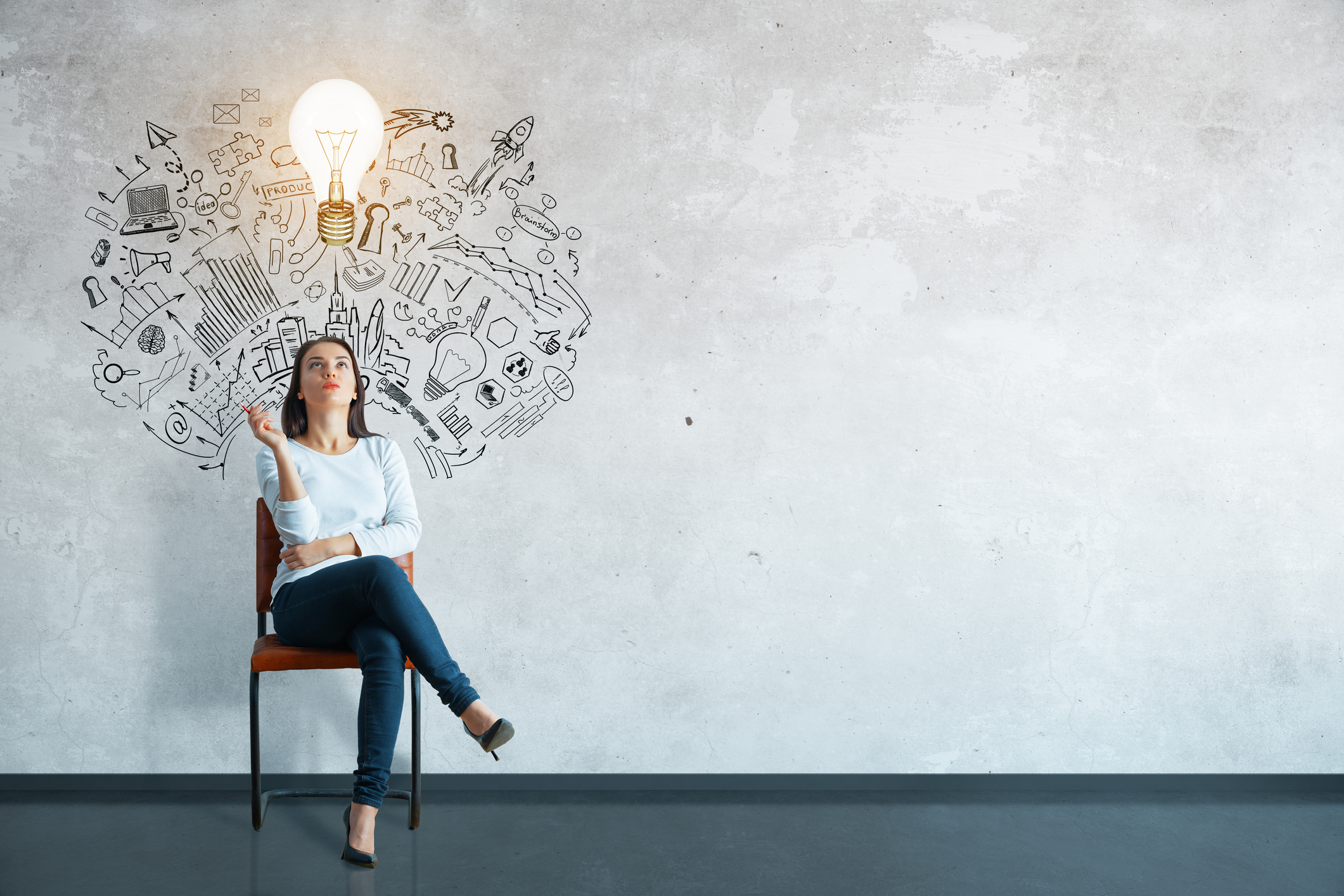 Woman thinking with lightbulb over head.